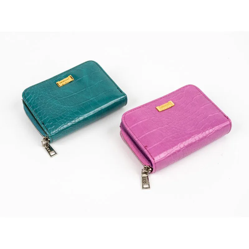 Apa warna dompet yang harus saya beli untuk wanita menarik kekayaan?